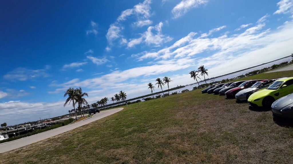 Line of Aston Martins on the waterfront at Tarpon Point, Cape Coral