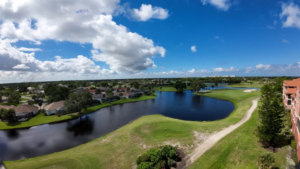 Golf course lake and fairway at Burnt Store, shot by drone