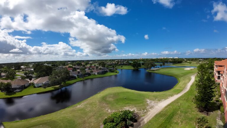 Golf course lake and fairway at Burnt Store, shot by drone