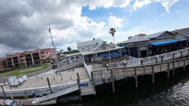 Waterfront restaurant deck and docks at Burnt Store Marina
