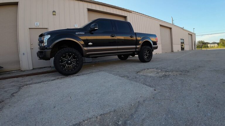 Custom black truck outside the Exo Performance shop