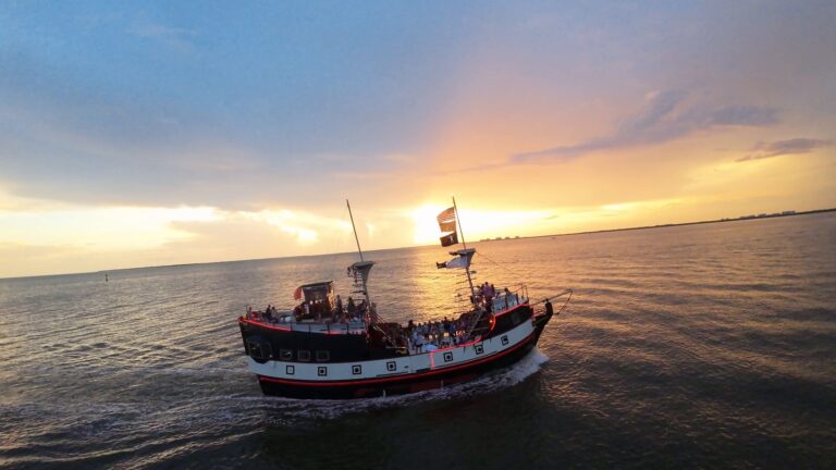 Pirate ship sailing at sunset on the Gulf, filmed for a music video