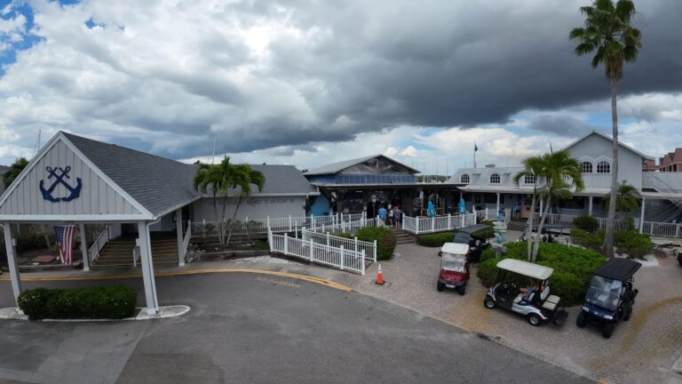 Safe Harbor Burnt Store marina building and golf carts during a business expo